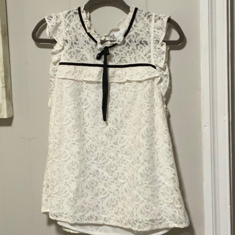 Elegant White Lace Top with Black Trim